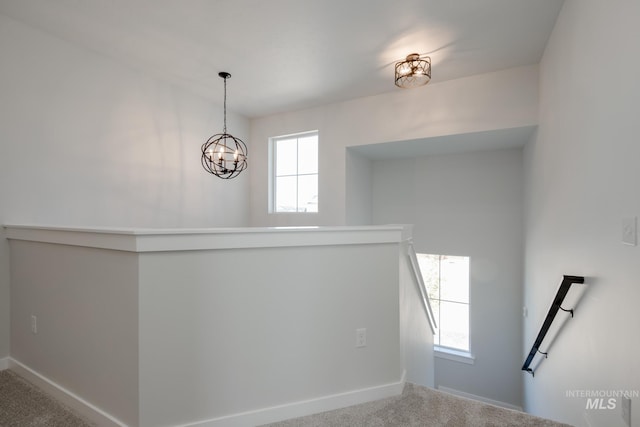 6847 W Riverwood St, Boise, ID 83709 - stairs featuring carpet floors, a chandelier, and baseboards
