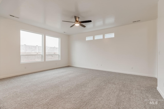 6847 W Riverwood St, Boise, ID 83709 - carpeted spare room featuring visible vents, ceiling fan, and baseboards