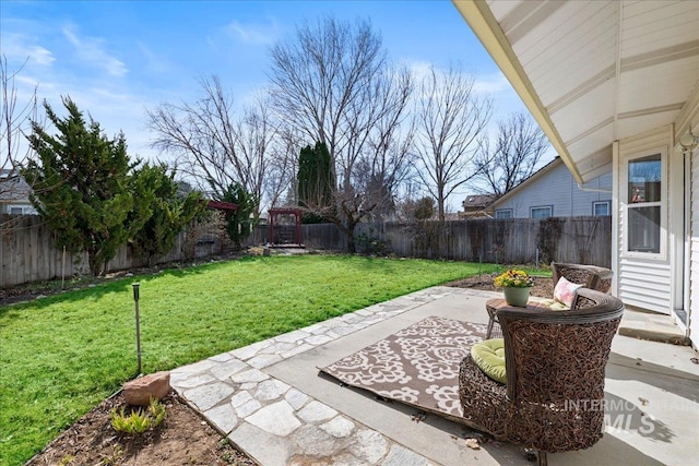 view of yard with a patio and a fenced backyard