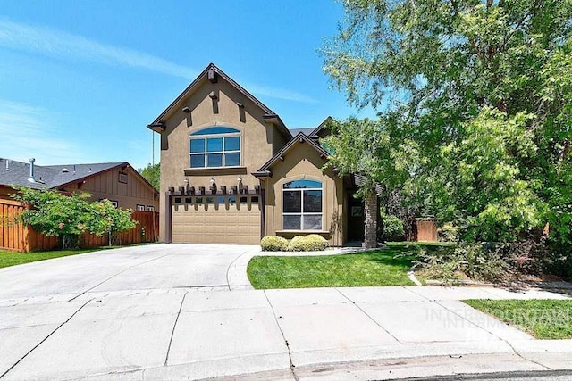 1878 W Sheep Hill Ct, Meridian, ID 83646 - view of front facade featuring an attached garage, concrete driveway, and stucco siding