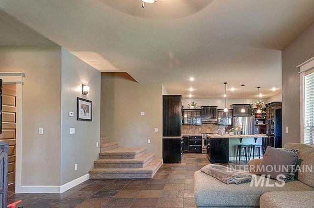 1878 W Sheep Hill Ct, Meridian, ID 83646 - living room with baseboards and stairs