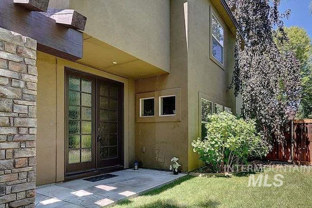 1878 W Sheep Hill Ct, Meridian, ID 83646 - view of exterior entry with stucco siding