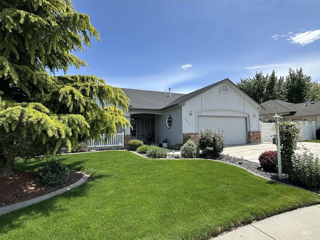 2680 N Phoenix, Meridian, ID 83646 - single story home featuring a garage, covered porch, driveway, a shingled roof, and brick siding