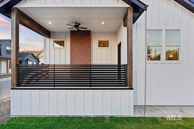 exterior space with ceiling fan
