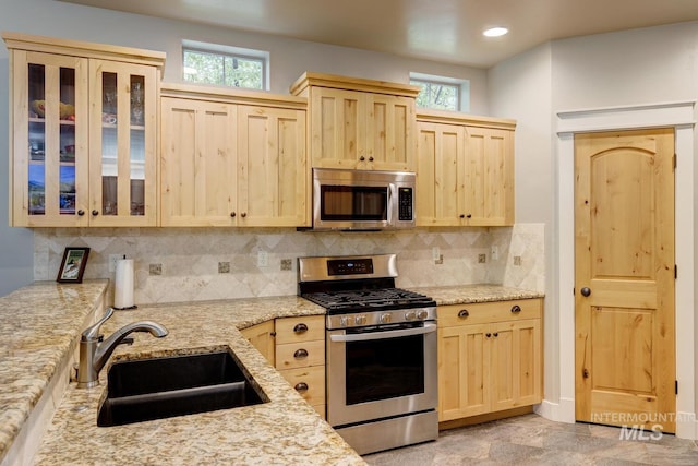 12507 N Humphreys Way, Boise, ID 83714 - kitchen featuring light brown cabinetry, stainless steel appliances, a sink, and recessed lighting