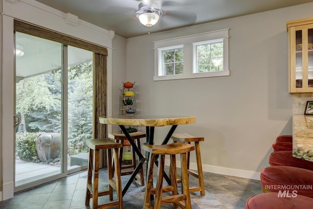 12507 N Humphreys Way, Boise, ID 83714 - dining area with a ceiling fan and baseboards