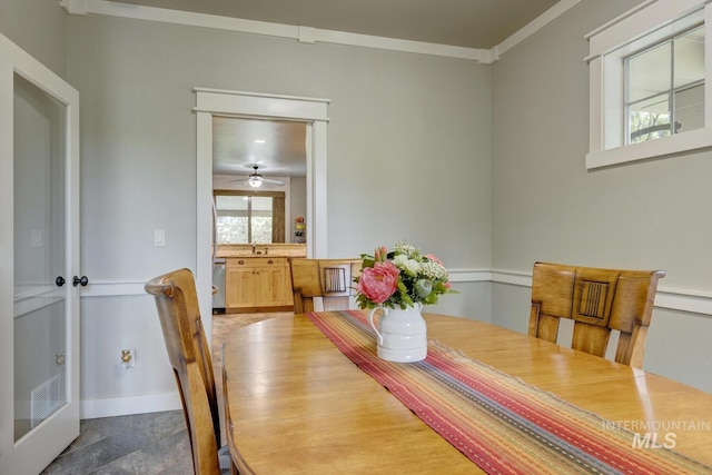 12507 N Humphreys Way, Boise, ID 83714 - dining space featuring crown molding, ceiling fan, and baseboards