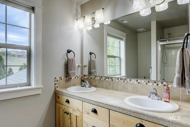 12507 N Humphreys Way, Boise, ID 83714 - full bath with double vanity, backsplash, and a shower