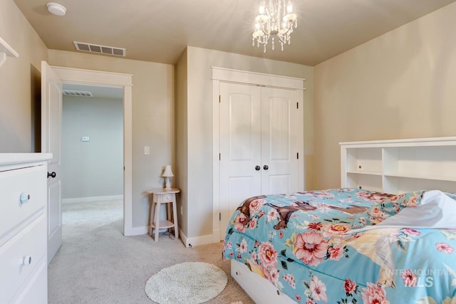 12507 N Humphreys Way, Boise, ID 83714 - bedroom with a closet, light carpet, baseboards, and a chandelier