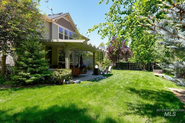 12507 N Humphreys Way, Boise, ID 83714 - view of yard featuring a patio