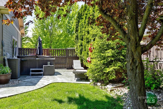 12507 N Humphreys Way, Boise, ID 83714 - view of yard featuring a hot tub and a patio