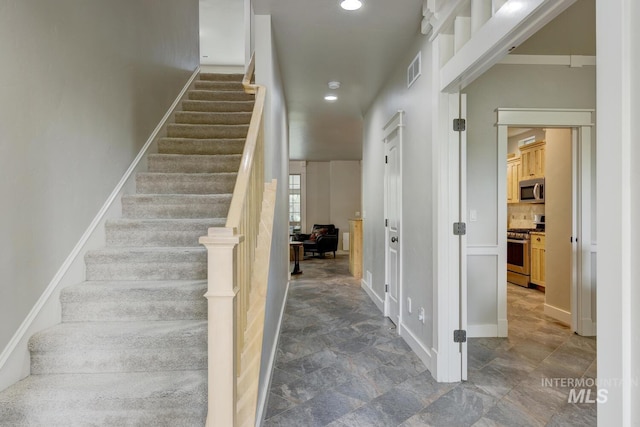 12507 N Humphreys Way, Boise, ID 83714 - staircase with recessed lighting, stone finish flooring, and baseboards