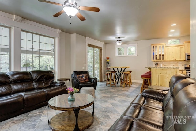 12507 N Humphreys Way, Boise, ID 83714 - living room with a ceiling fan, baseboards, and recessed lighting