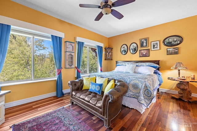 911 Davis, Mccall, ID 83638 - bedroom with baseboards, wood finished floors, and a ceiling fan