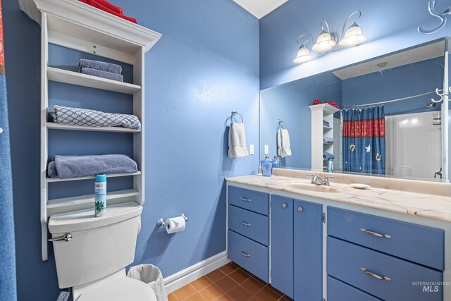 911 Davis, Mccall, ID 83638 - bathroom with vanity, tile patterned flooring, toilet, curtained shower, and baseboards