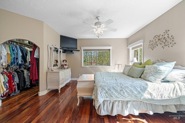 911 Davis, Mccall, ID 83638 - bedroom with a closet, wood finished floors, baseboards, and a ceiling fan
