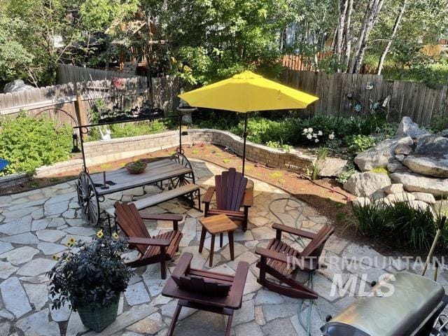 911 Davis, Mccall, ID 83638 - fenced backyard featuring outdoor dining area and a patio area