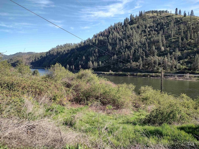 property view of mountains featuring a water view