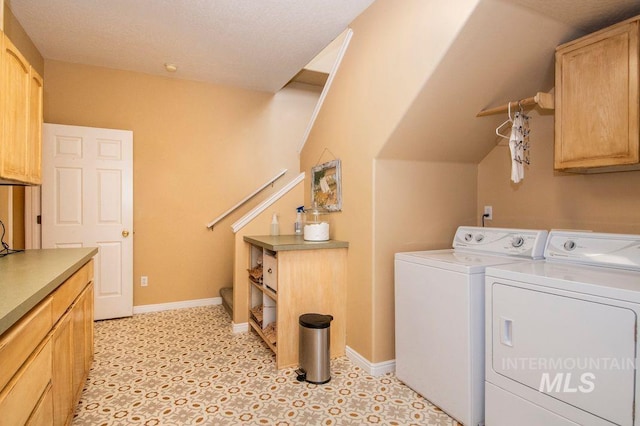 8344 Partridge Dr, Nampa, ID 83686 - laundry room with separate washer and dryer, baseboards, and cabinet space