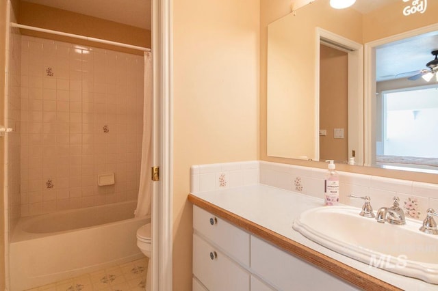 8344 Partridge Dr, Nampa, ID 83686 - full bathroom featuring vanity, toilet, shower / bath combo, and a ceiling fan