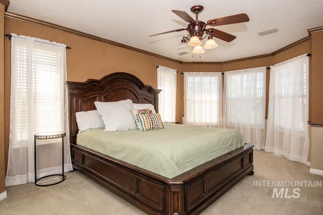 8344 Partridge Dr, Nampa, ID 83686 - bedroom with baseboards, crown molding, and light carpet