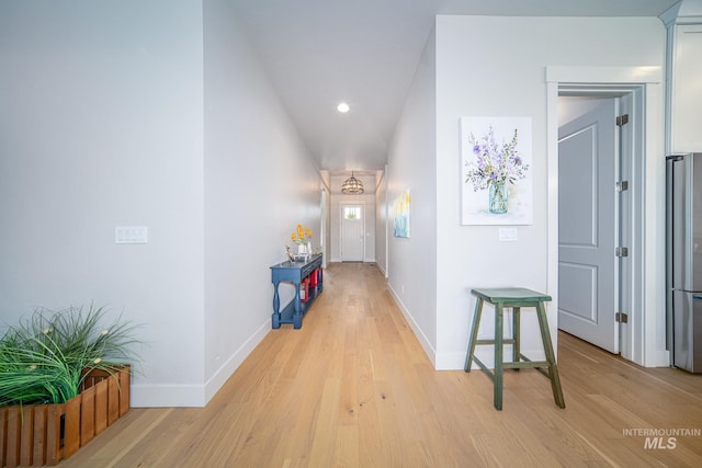 hallway featuring light wood-type flooring