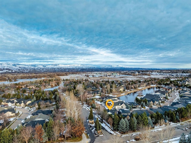 birds eye view of property with a residential view and a water view