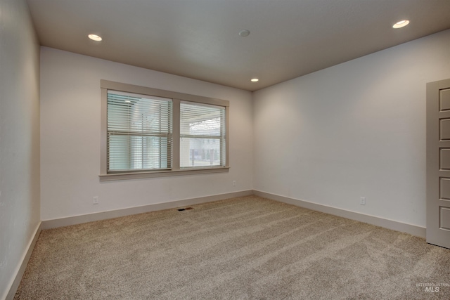 view of carpeted spare room