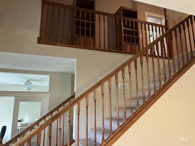 11565 W Zachery Ave, Nampa, ID 83651 - staircase featuring a ceiling fan