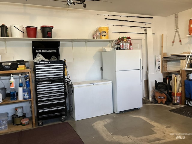 11565 W Zachery Ave, Nampa, ID 83651 - garage featuring freestanding refrigerator and refrigerator
