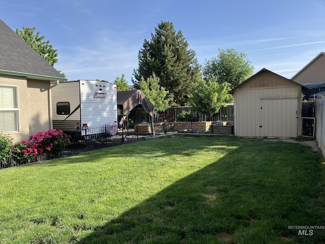 11565 W Zachery Ave, Nampa, ID 83651 - view of yard featuring a storage unit and an outbuilding
