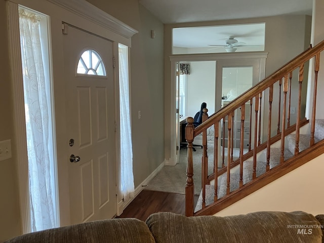 11565 W Zachery Ave, Nampa, ID 83651 - entrance foyer with stairs, wood finished floors, ceiling fan, and baseboards