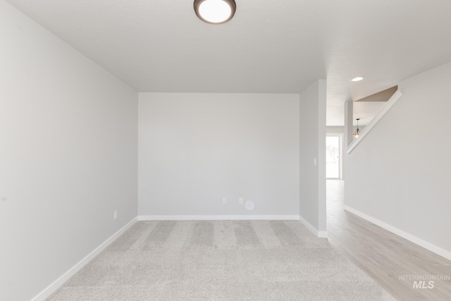 2351 W Opalite Dr, Kuna, ID 83634 - carpeted empty room featuring baseboards and recessed lighting