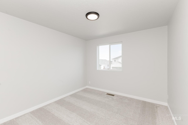 2351 W Opalite Dr, Kuna, ID 83634 - empty room featuring baseboards and light carpet