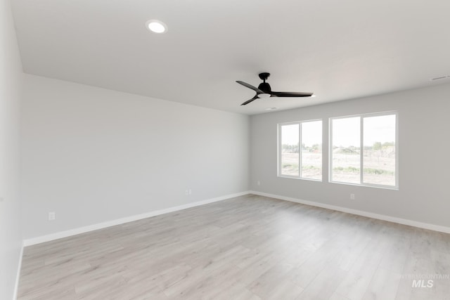 2351 W Opalite Dr, Kuna, ID 83634 - spare room with ceiling fan, baseboards, light wood finished floors, and recessed lighting