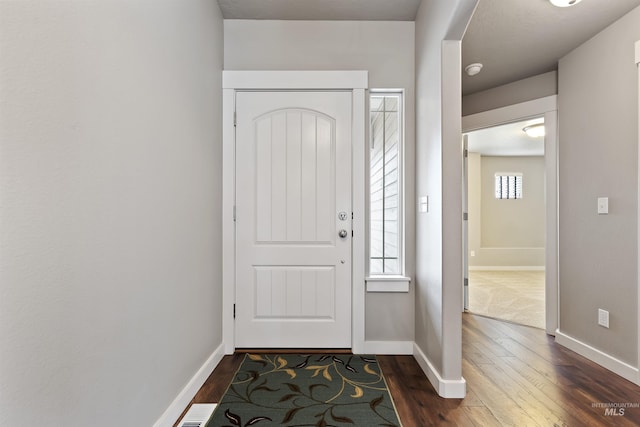 entrance foyer with dark wood-type flooring