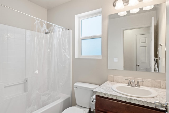 full bathroom with toilet, vanity, and shower / tub combo with curtain