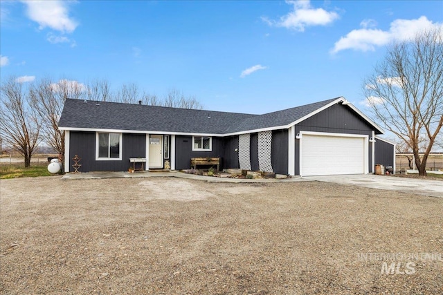 single story home with a garage