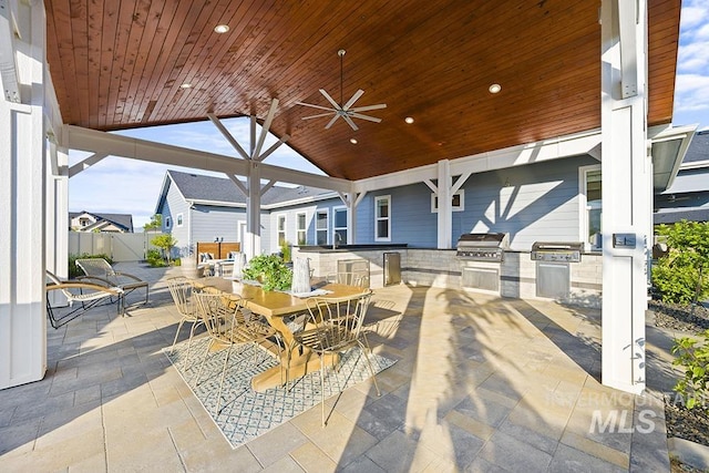 5445 S Mesa Trail Pl, Meridian, ID 83642 - view of patio with outdoor dining area, ceiling fan, and a sink