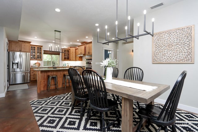570 E Ocelot, Meridian, ID 83646 - dining area featuring recessed lighting, baseboards, and a chandelier