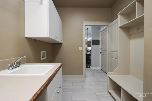 570 E Ocelot, Meridian, ID 83646 - laundry area featuring hookup for a washing machine, cabinet space, and baseboards