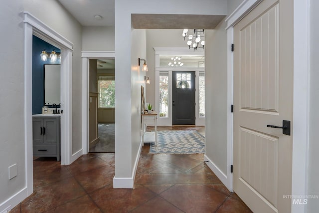 570 E Ocelot, Meridian, ID 83646 - foyer with a chandelier and baseboards