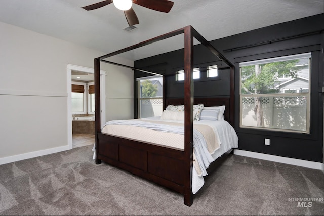 570 E Ocelot, Meridian, ID 83646 - carpeted bedroom featuring multiple windows, baseboards, ensuite bath, and a ceiling fan