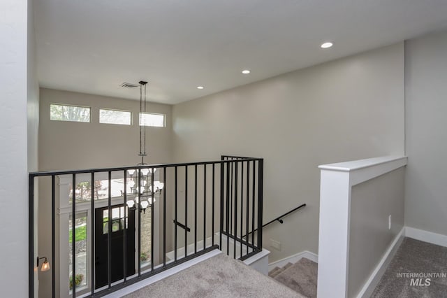 570 E Ocelot, Meridian, ID 83646 - staircase with carpet floors, a chandelier, baseboards, and recessed lighting