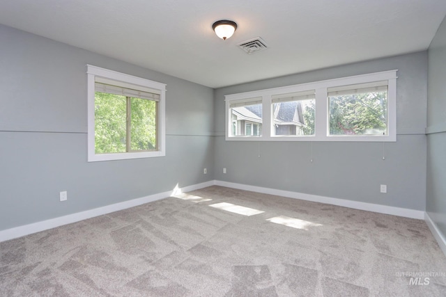 570 E Ocelot, Meridian, ID 83646 - carpeted spare room featuring healthy amount of natural light and baseboards