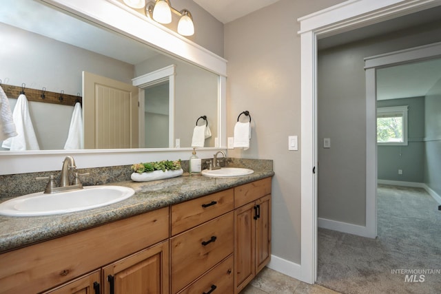 570 E Ocelot, Meridian, ID 83646 - bathroom with baseboards and double vanity