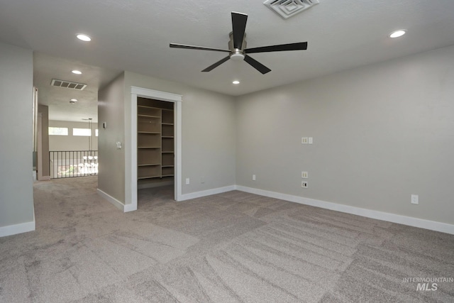 570 E Ocelot, Meridian, ID 83646 - empty room featuring a ceiling fan, carpet flooring, baseboards, and recessed lighting
