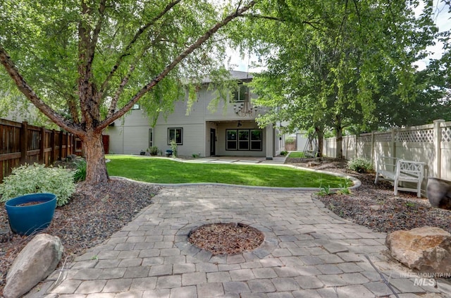 570 E Ocelot, Meridian, ID 83646 - back of house with a patio area