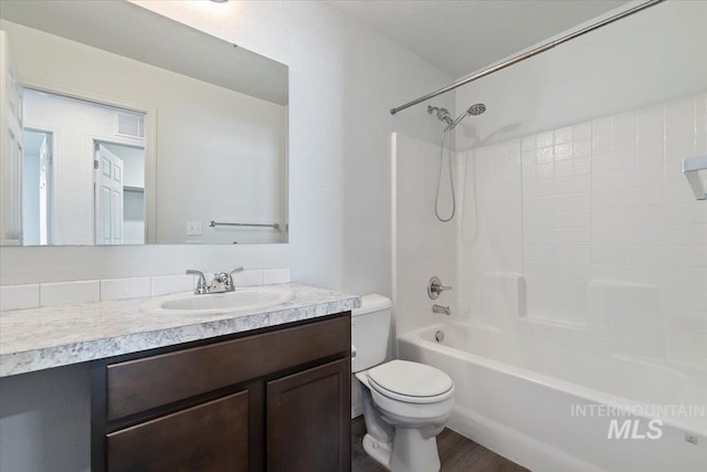 full bathroom featuring vanity, toilet, and shower / bathing tub combination