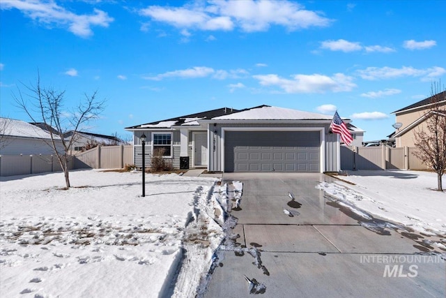 single story home featuring a garage